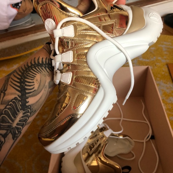 Metallic Gold Louis Vuitton arch light sneakers. - Picture 5 of 7
